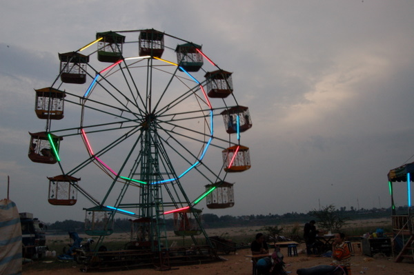 Ferris wheel on Vientiane waterfront. Not exactly the London Eye.